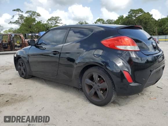 2014 Hyundai Veloster z VIN KMHTC6AD3EU196343, wystawiony jako Copart lot #59891375 z przebiegiem 127 594 mil mil oraz Szkoda całkowita • Salvage title. Historia ofert i sprzedaży dostępna na DreamBid. Obrazek 2.