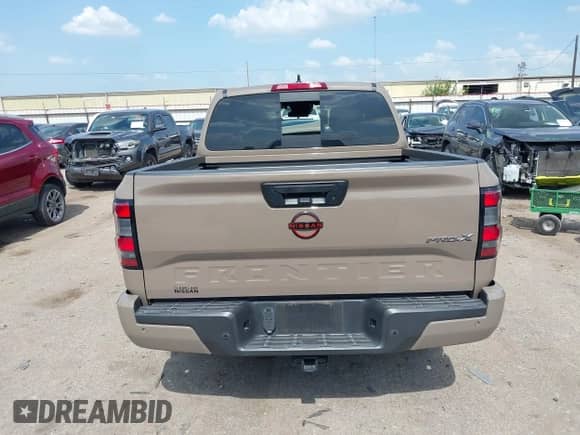 2023 Nissan Frontier Pro-X with VIN 1N6ED1EJXPN657609, listed as a IAAI auction lot 42852823 with 22,584 mi miles and . Bid and sale history available at DreamBid. Image 17.