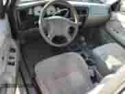 2002 Toyota Tacoma z VIN 5TEWN72NX2Z070220, wystawiony jako Copart lot #81276465 z przebiegiem 143 793 mil mil oraz Szkoda całkowita • Salvage title. Historia ofert i sprzedaży dostępna na DreamBid. Obrazek 8.