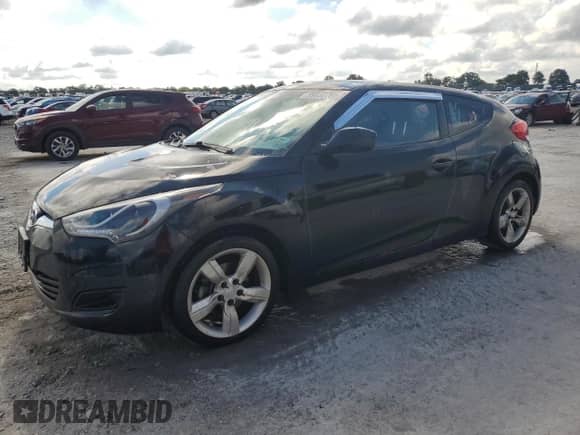 2015 Hyundai Veloster z VIN KMHTC6AD0FU237545, wystawiony jako Copart lot #69858765 z przebiegiem 182 058 mil mil oraz Szkoda całkowita • Salvage title. Historia ofert i sprzedaży dostępna na DreamBid. Obrazek 1.