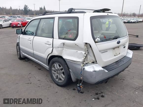 2007 Subaru Forester X L.L. Bean with VIN JF1SG67617H715811, listed as a IAAI auction lot 41332386 with 106,361 mi miles and . Bid and sale history available at DreamBid. Image 3.