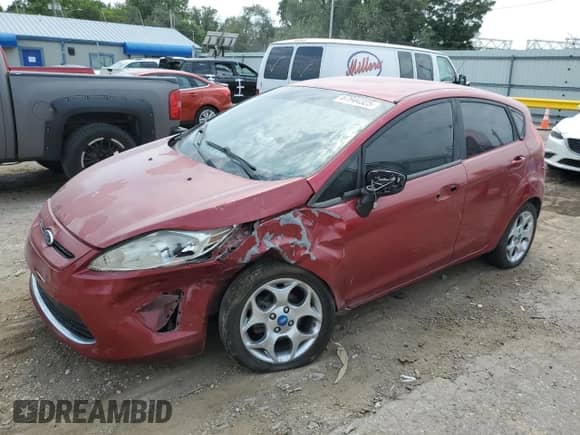 2011 Ford Fiesta SES with VIN 3FADP4FJ7BM223727, listed as a Copart auction lot 67944325 with 147,467 mi miles and Salvage title. Bid and sale history available at DreamBid. Image 1.