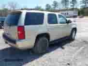 2009 Chevrolet Tahoe 2LT with VIN 1GNFC230X9R214759, listed as a IAAI auction lot 41879645 with 155,344 mi miles and . Bid and sale history available at DreamBid. Image 4.