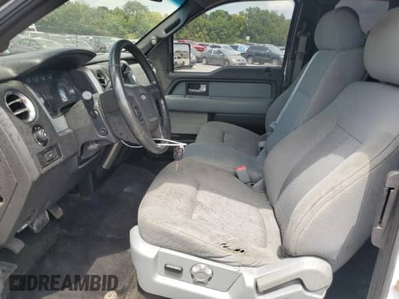 2013 Ford F-150 XLT z VIN 1FTFX1CF8DFD44500, wystawiony jako Copart lot #66993855 z przebiegiem 192 864 mil mil oraz Szkoda całkowita • Salvage title. Historia ofert i sprzedaży dostępna na DreamBid. Obrazek 7.
