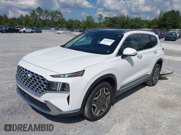 2023 Hyundai Santa Fe Limited with VIN 5NMS44AL0PH633816, listed as a IAAI auction lot 43324554 with 31,271 mi miles and . Bid and sale history available at DreamBid. Image 2.