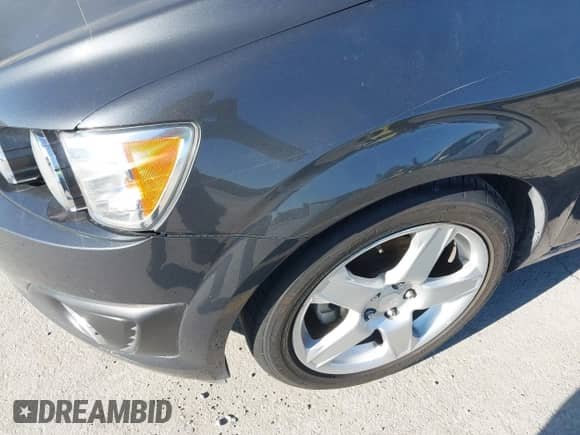 2015 Chevrolet Sonic LTZ with VIN 1G1JE6SB6F4125831, listed as a IAAI auction lot 43364524 with 152,774 mi miles and . Bid and sale history available at DreamBid. Image 6.