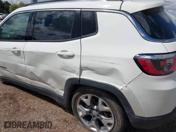 2019 Jeep Compass Limited with VIN 3C4NJDCB0KT747725, listed as a IAAI auction lot 43251726 with 97,576 mi miles and . Bid and sale history available at DreamBid. Image 6.