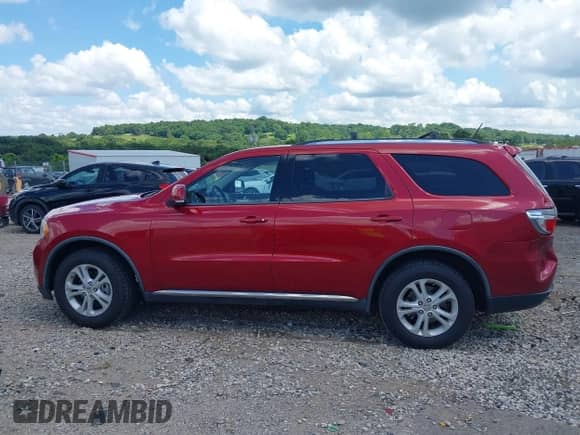 2011 Dodge Durango Crew with VIN 1D4RD4GG8BC634392, listed as a IAAI auction lot 42552266 with 166,166 mi miles and . Bid and sale history available at DreamBid. Image 14.