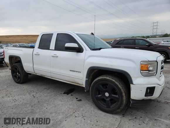 2015 GMC Sierra 1500 with VIN 1GTV2TEC8FZ437186, listed as a Copart auction lot 71327095 with 170,896 mi miles and Salvage title. Bid and sale history available at DreamBid. Image 4.