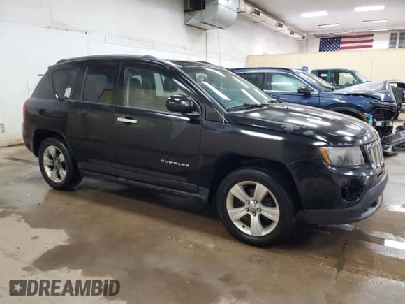 2014 Jeep Compass Sport z VIN 1C4NJDAB6ED728271, wystawiony jako Copart lot #70187355 z przebiegiem 224 993 mil mil oraz Czysty tytuł • Clean title. Historia ofert i sprzedaży dostępna na DreamBid. Obrazek 4.
