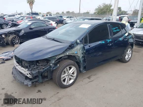 2019 Toyota Corolla SE with VIN JTNK4RBE9K3023865, listed as a IAAI auction lot 43315858 with 97,757 mi miles and . Bid and sale history available at DreamBid. Image 2.