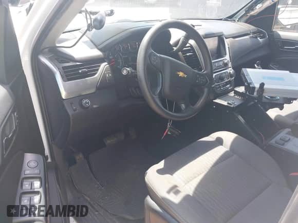 2020 Chevrolet Tahoe Commercial z VIN 1GNLCDECXLR154849, wystawiony jako IAAI lot #42050778 z przebiegiem 124 771 mil mil oraz . Historia ofert i sprzedaży dostępna na DreamBid. Obrazek 17.