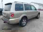 2006 Honda Pilot EX z VIN 2HKYF18416H501571, wystawiony jako IAAI lot #42902211 z przebiegiem 196 289 mil mil oraz . Historia ofert i sprzedaży dostępna na DreamBid. Obrazek 4.