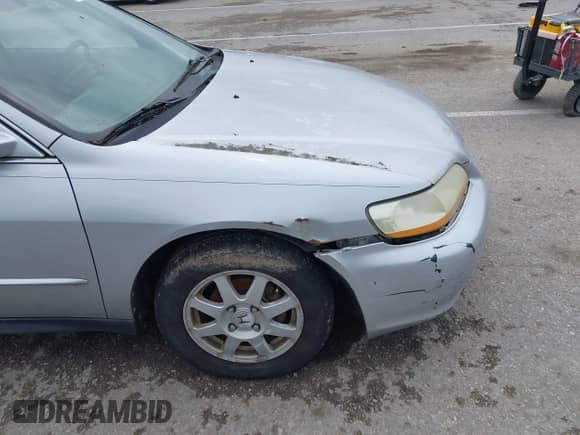 2002 Honda Accord SE with VIN 1HGCG56712A088663, listed as a IAAI auction lot 42520639 with 230,496 mi miles and . Bid and sale history available at DreamBid. Image 12.