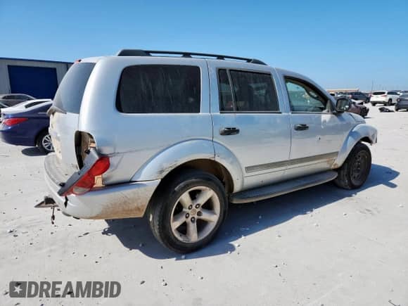 2004 Dodge Durango SLT z VIN 1D4HD48D94F182499, wystawiony jako Copart lot #66541485 z przebiegiem 245 941 mil mil oraz Szkoda całkowita • Salvage title. Historia ofert i sprzedaży dostępna na DreamBid. Obrazek 3.