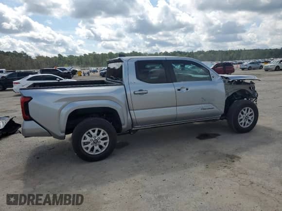 2024 Toyota Tacoma SR5 with VIN 3TMKB5FN1RM023512, listed as a Copart auction lot 68438505 with 5,994 mi miles and Salvage title. Bid and sale history available at DreamBid. Image 3.