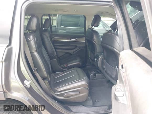 2023 Jeep Grand Cherokee Limited with VIN 1C4RJJBG8P8746051, listed as a IAAI auction lot 42086560 with 63,505 mi miles and . Bid and sale history available at DreamBid. Image 8.