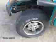 1997 Jeep Wrangler SE z VIN 1J4FY29P7VP447481, wystawiony jako IAAI lot #43438550 z przebiegiem 190 965 mil mil oraz . Historia ofert i sprzedaży dostępna na DreamBid. Obrazek 12.