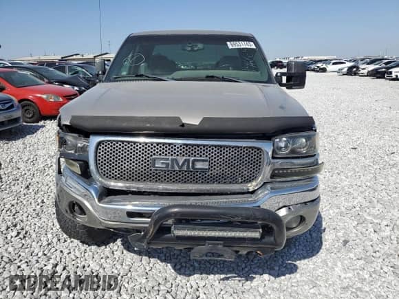2003 GMC Sierra 1500 SLE with VIN 2GTEK19T731146665, listed as a Copart auction lot 69531743 with 119,687 mi miles and Salvage title. Bid and sale history available at DreamBid. Image 5.