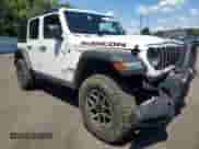 2024 Jeep Wrangler Rubicon with VIN 1C4PJXFG5RW336004, listed as a Copart auction lot 70039565 with 22,201 mi miles and Clean title. Bid and sale history available at DreamBid. Image 4.