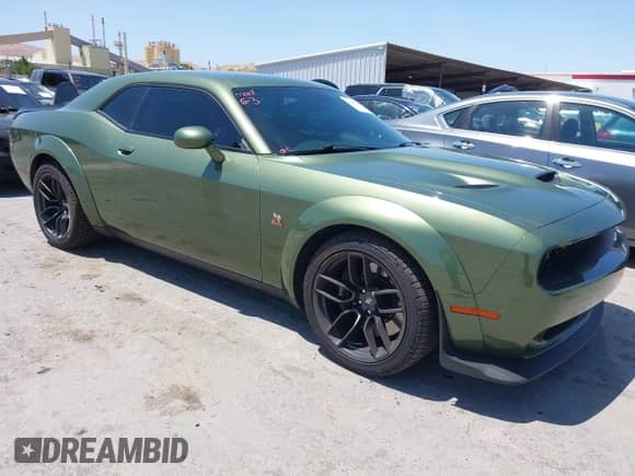 2022 Dodge Challenger R/T Scat Pack Widebody z VIN 2C3CDZFJ8NH177621, wystawiony jako IAAI lot #42358022 z przebiegiem 19 076 mil mil oraz . Historia ofert i sprzedaży dostępna na DreamBid. Obrazek 1.