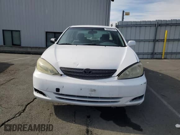 2004 Toyota Camry LE z VIN JTDBE32K540272608, wystawiony jako Copart lot #90066615 z przebiegiem 337 761 mil mil oraz Czysty tytuł • Clean title. Historia ofert i sprzedaży dostępna na DreamBid. Obrazek 5.
