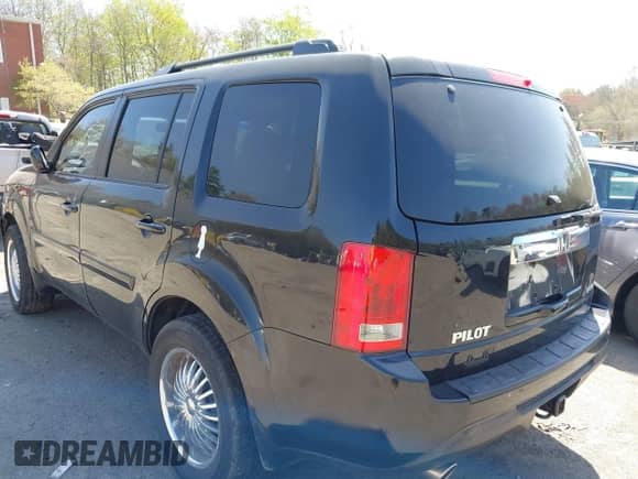 2013 Honda Pilot EX-L with VIN 5FNYF4H75DB002151, listed as a IAAI auction lot 42141451 with 223,651 mi miles and . Bid and sale history available at DreamBid. Image 3.