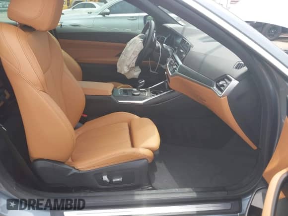 2022 BMW 4 Series 430i z VIN WBA23AT09NCJ64044, wystawiony jako IAAI lot #42287407 z przebiegiem Nie podano mil oraz . Historia ofert i sprzedaży dostępna na DreamBid. Obrazek 5.