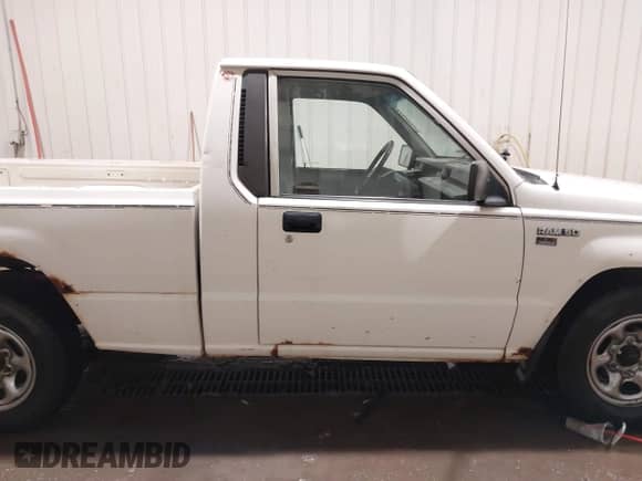 1992 Dodge RAM with VIN JB7FL24W7NP011183, listed as a IAAI auction lot 41586341 with 166,501 mi miles and . Bid and sale history available at DreamBid. Image 14.
