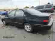 1997 Toyota Camry LE with VIN 4T1BG22KXVU821763, listed as a Copart auction lot 71875345 with 205,057 mi miles and Salvage title. Bid and sale history available at DreamBid. Image 2.