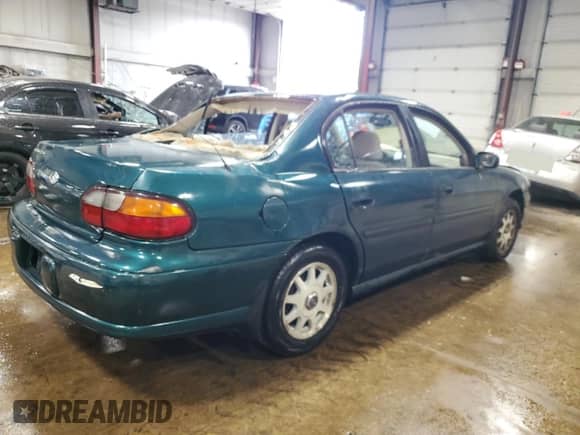 1998 Chevrolet Malibu LS с VIN 1G1NE52MXW6193681, выставлен на аукционе Copart как лот 61834655 с пробегом 174 015 миль миль и Списание • Salvage title. История ставок и продаж доступна на DreamBid. Изображение 3.