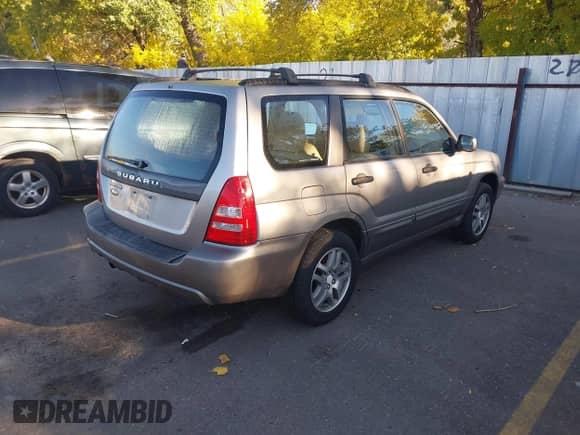 2005 Subaru Forester XS L.L. Bean with VIN JF1SG67675H709296, listed as a IAAI auction lot 43464673 with 177,362 mi miles and . Bid and sale history available at DreamBid. Image 4.