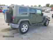2007 Jeep Wrangler Unlimited Sahara z VIN 1J4GA59187L104520, wystawiony jako Copart lot #86331095 z przebiegiem 213 087 mil mil oraz Czysty tytuł • Clean title. Historia ofert i sprzedaży dostępna na DreamBid. Obrazek 3.