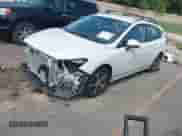 2020 Subaru Impreza Premium with VIN 4S3GTAV60L3707837, listed as a IAAI auction lot 42474529 with 65,464 mi miles and . Bid and sale history available at DreamBid. Image 2.