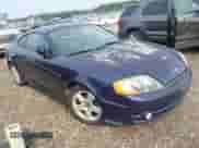 2003 Hyundai Tiburon with VIN KMHHM65D23U083655, listed as a IAAI auction lot 42923698 with Not provided miles and . Bid and sale history available at DreamBid. Image 1.