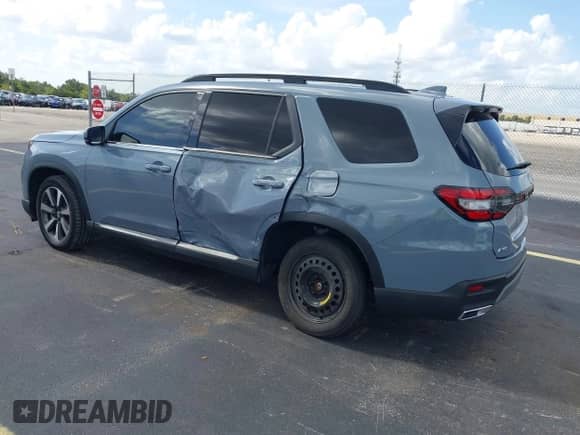 2024 Honda Pilot Elite with VIN 5FNYG1H84RB015114, listed as a IAAI auction lot 43082030 with 26,877 mi miles and . Bid and sale history available at DreamBid. Image 3.