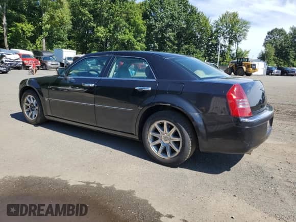 2006 Chrysler 300 C with VIN 2C3KA63H76H274864, listed as a Copart auction lot 72061735 with 201,859 mi miles and Salvage title. Bid and sale history available at DreamBid. Image 2.