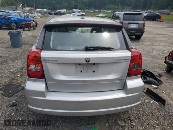 2009 Dodge Caliber SXT z VIN 1B3HB48A69D164622, wystawiony jako Copart lot #67573855 z przebiegiem Nie podano mil oraz Szkoda całkowita • Salvage title. Historia ofert i sprzedaży dostępna na DreamBid. Obrazek 6.