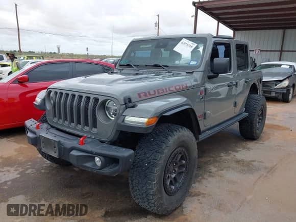2021 Jeep Wrangler Unlimited Rubicon with VIN 1C4JJXFG8MW842795, listed as a IAAI auction lot 42571315 with 31,004 mi miles and . Bid and sale history available at DreamBid. Image 2.