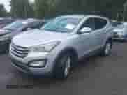 2014 Hyundai Santa Fe z VIN 5XYZU3LA9EG195437, wystawiony jako IAAI lot #43318157 z przebiegiem 82 644 mil mil oraz . Historia ofert i sprzedaży dostępna na DreamBid. Obrazek 17.