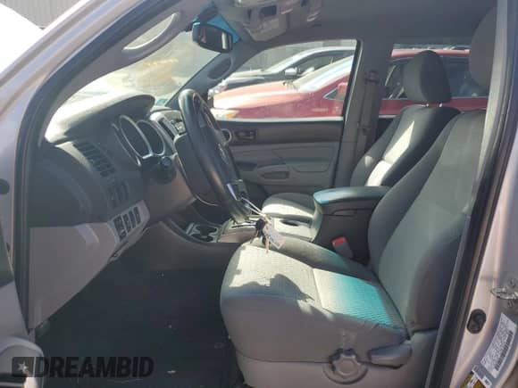 2012 Toyota Tacoma with VIN 3TMMU4FN6CM045381, listed as a Copart auction lot 70672235 with 174,354 mi miles and Salvage title. Bid and sale history available at DreamBid. Image 7.