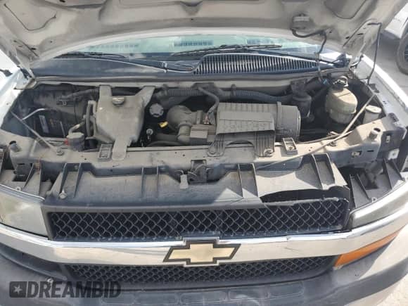 2013 Chevrolet Express Passenger LT z VIN 1GAZG1FG7D1121873, wystawiony jako Copart lot #64763815 z przebiegiem Nie podano mil oraz Czysty tytuł • Clean title. Historia ofert i sprzedaży dostępna na DreamBid. Obrazek 12.