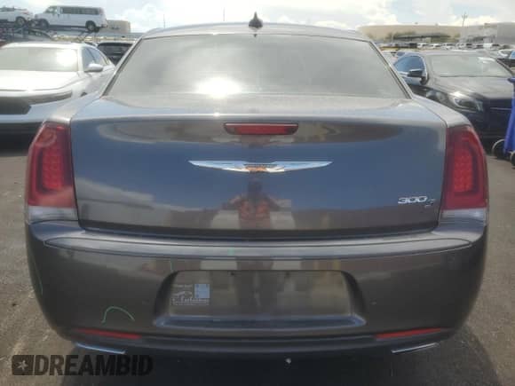 2015 Chrysler 300 S с VIN 2C3CCABG3FH802958, выставлен на аукционе Copart как лот 71697965 с пробегом 155 567 миль миль и Списание • Salvage title. История ставок и продаж доступна на DreamBid. Изображение 6.