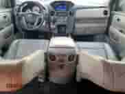 2014 Honda Pilot EX-L with VIN 5FNYF3H56EB001925, listed as a Copart auction lot 80243515 with 119,891 mi miles and Salvage title. Bid and sale history available at DreamBid. Image 8.