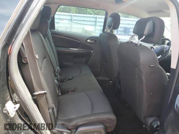 2015 Dodge Journey American Value with VIN 3C4PDCAB2FT644972, listed as a Copart auction lot 64377425 with 131,776 mi miles and Salvage title. Bid and sale history available at DreamBid. Image 11.