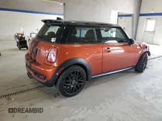 2013 MINI Hardtop S with VIN WMWSV3C52DT396176, listed as a Copart auction lot 59207165 with 104,194 mi miles and Salvage title. Bid and sale history available at DreamBid. Image 3.