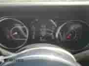 2021 Jeep Wrangler Unlimited Sahara Altitude z VIN 1C4HJXEN8MW794195, wystawiony jako Copart lot #61269515 z przebiegiem 28 118 mil mil oraz Szkoda całkowita • Salvage title. Historia ofert i sprzedaży dostępna na DreamBid. Obrazek 9.