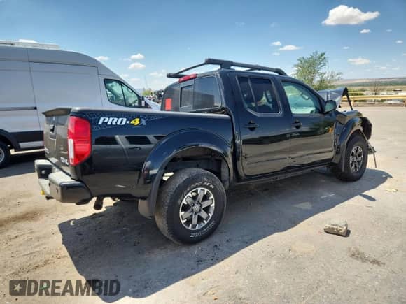 2017 Nissan Frontier Pro-4X with VIN 1N6AD0EV2HN745308, listed as a Copart auction lot 69839695 with 130,922 mi miles and Salvage title. Bid and sale history available at DreamBid. Image 3.