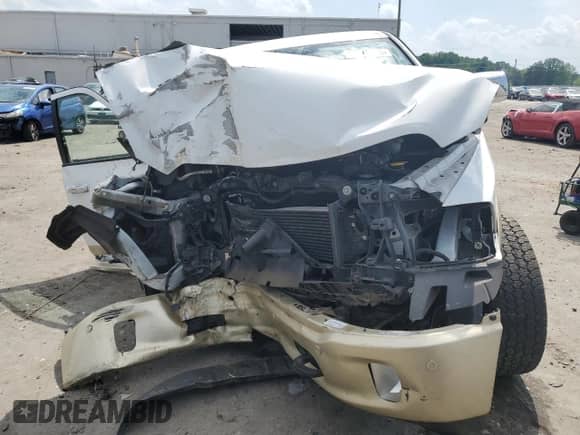 2014 Ram 1500 Longhorn z VIN 1C6RR7PM6ES403403, wystawiony jako Copart lot #55445445 z przebiegiem Nie podano mil oraz Szkoda całkowita • Salvage title. Historia ofert i sprzedaży dostępna na DreamBid. Obrazek 5.