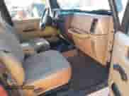 2000 Jeep Wrangler SE with VIN 1J4FA29P4YP773084, listed as a IAAI auction lot 43228933 with 114,188 mi miles and . Bid and sale history available at DreamBid. Image 5.